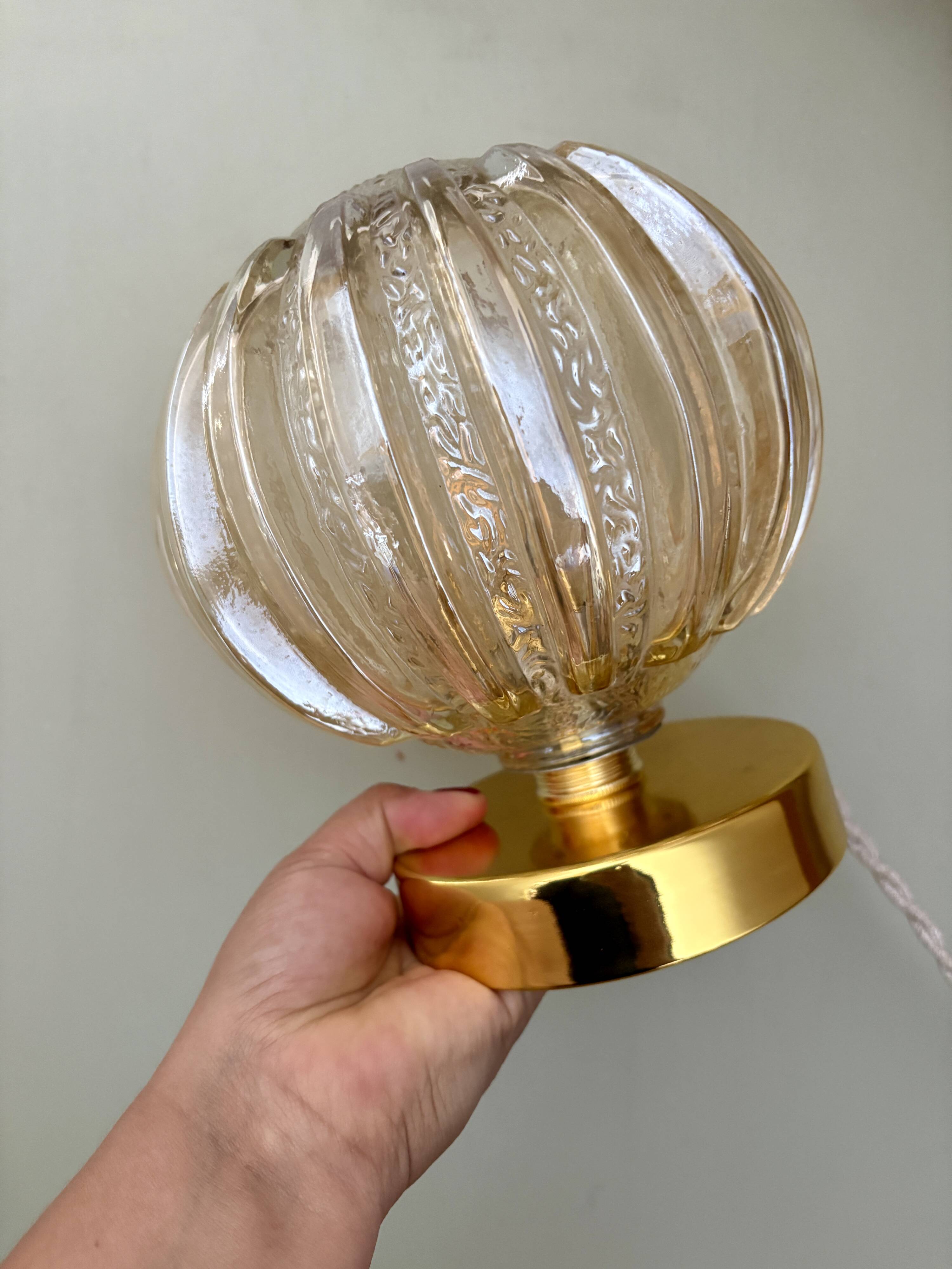 Vintage globe table lamp in half amber, half transparent molded glass