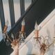 Pair of golden wall lights with vintage glass tassels