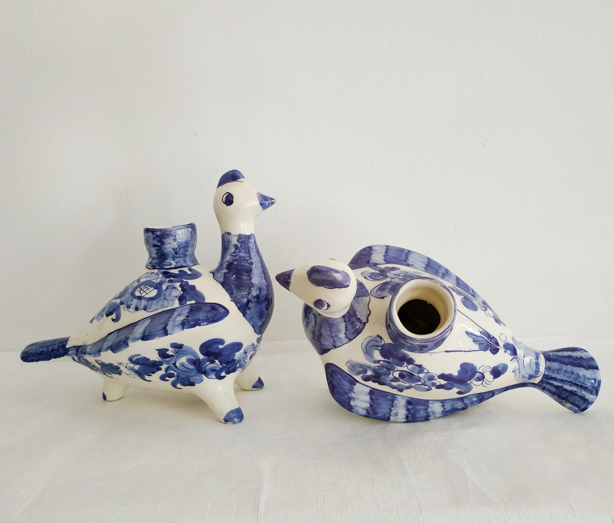 Pair of bird candlesticks in blue white, Skyros earthenware