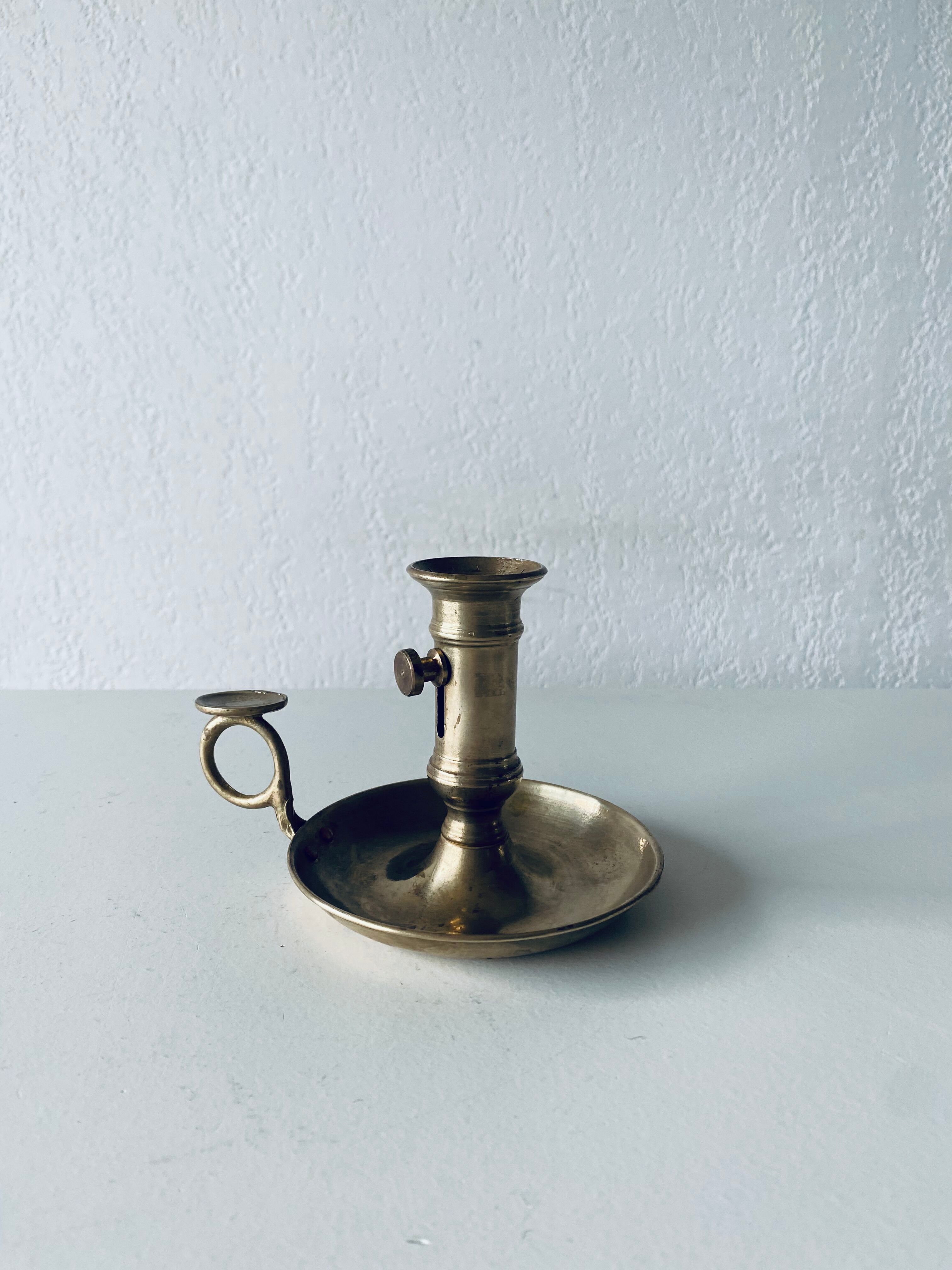 Antique brass candle holder