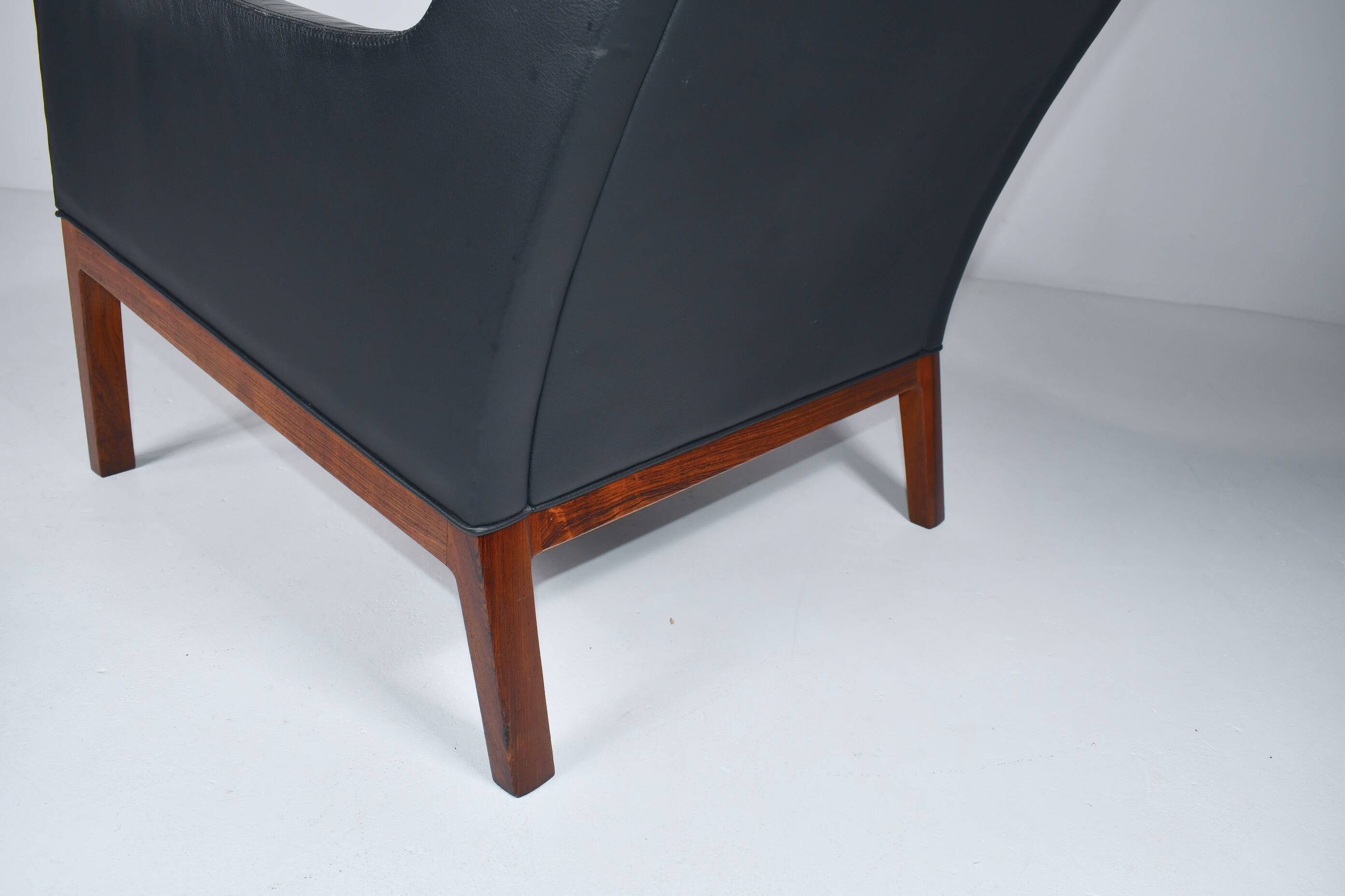 Leather armchair and footstool by Kai Lyngfeldt-Larsen. Denmark 1960s