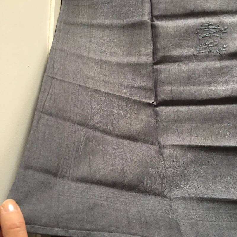 Old embroidered table napkin MA dark grey