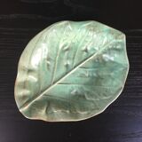 Embossed leaf pocket emptier
