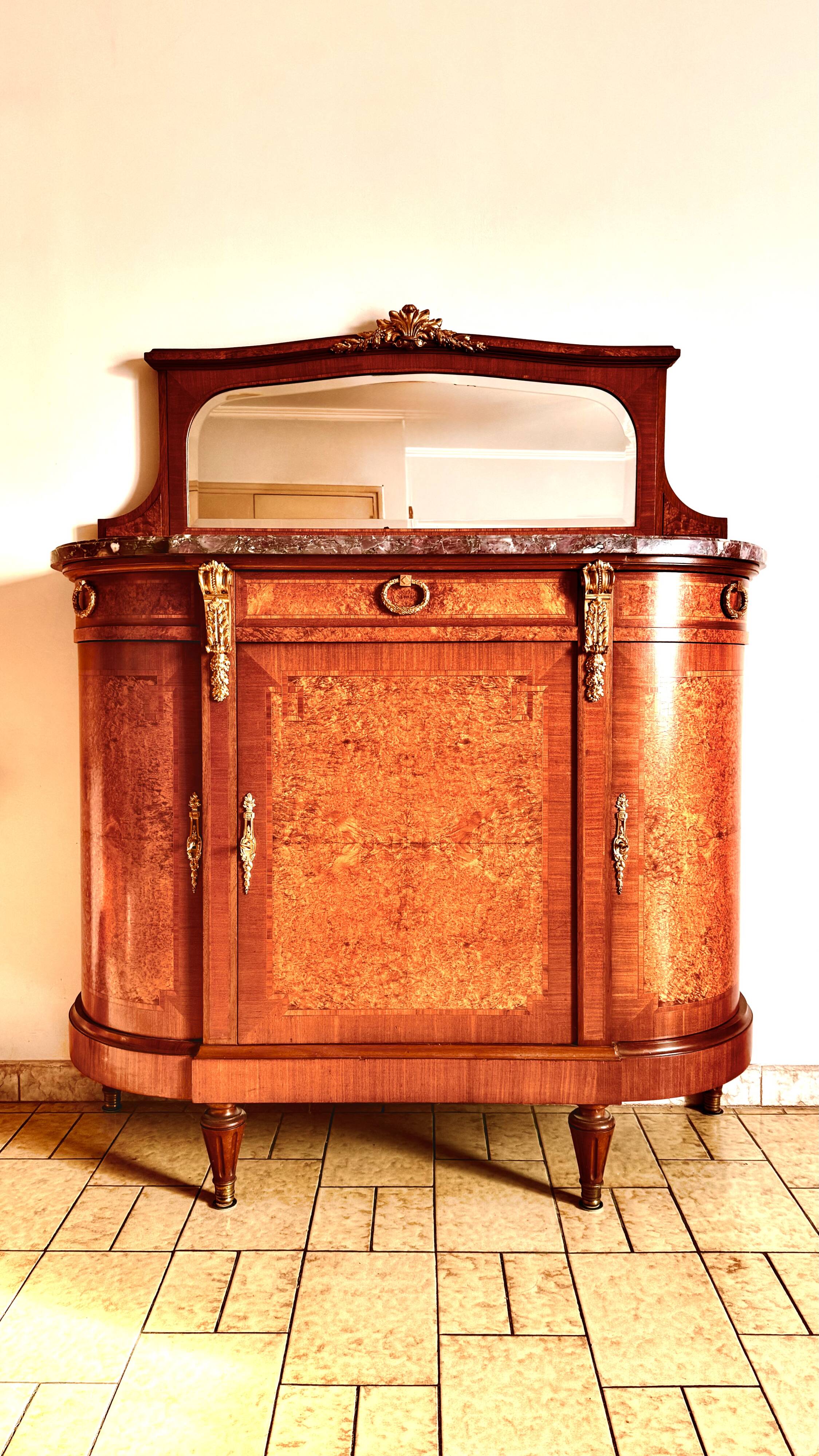 Rare antique buffet with marble, bronze, and marquetry in the Louis XVI style.