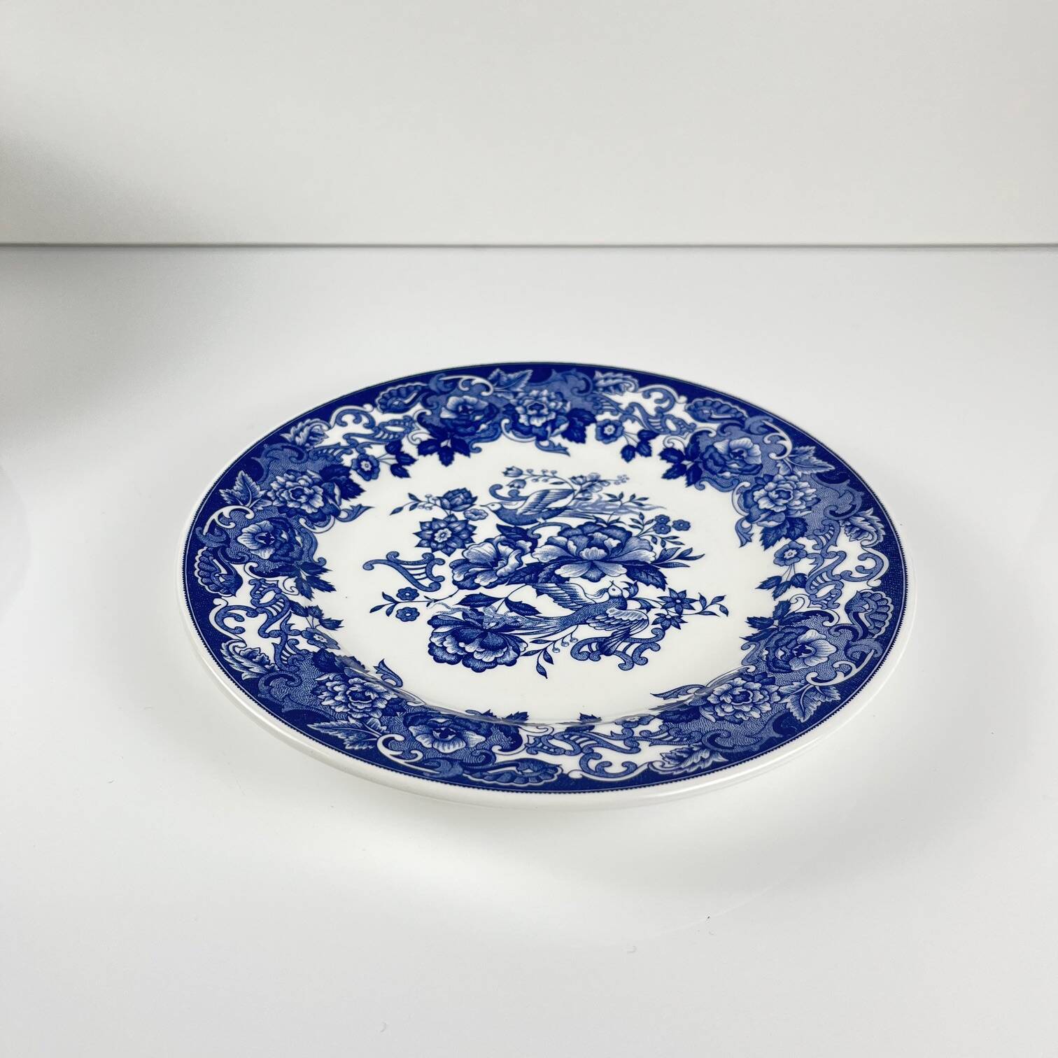 Set of 10 blue earthenware dessert plates with floral and bird decoration