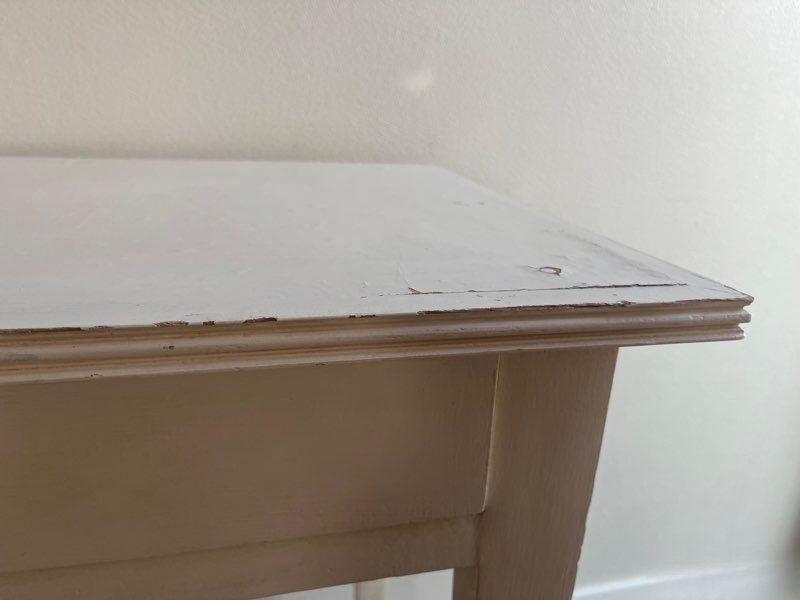 Old small table with a white patina / desk