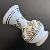 White vase with plant decoration