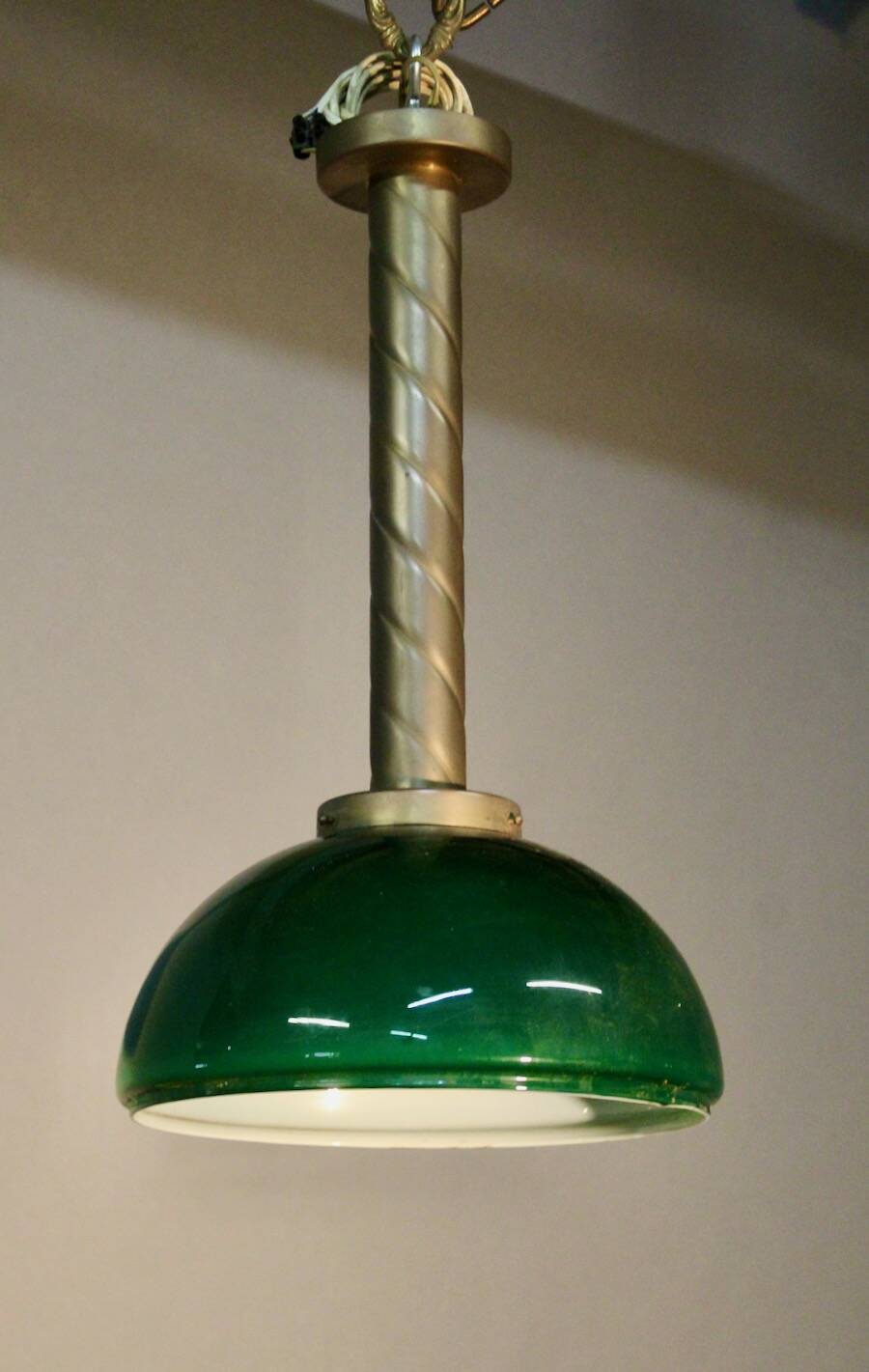 Chandelier with brass body and green opaline