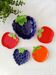 bowls and cups in slipware fruits