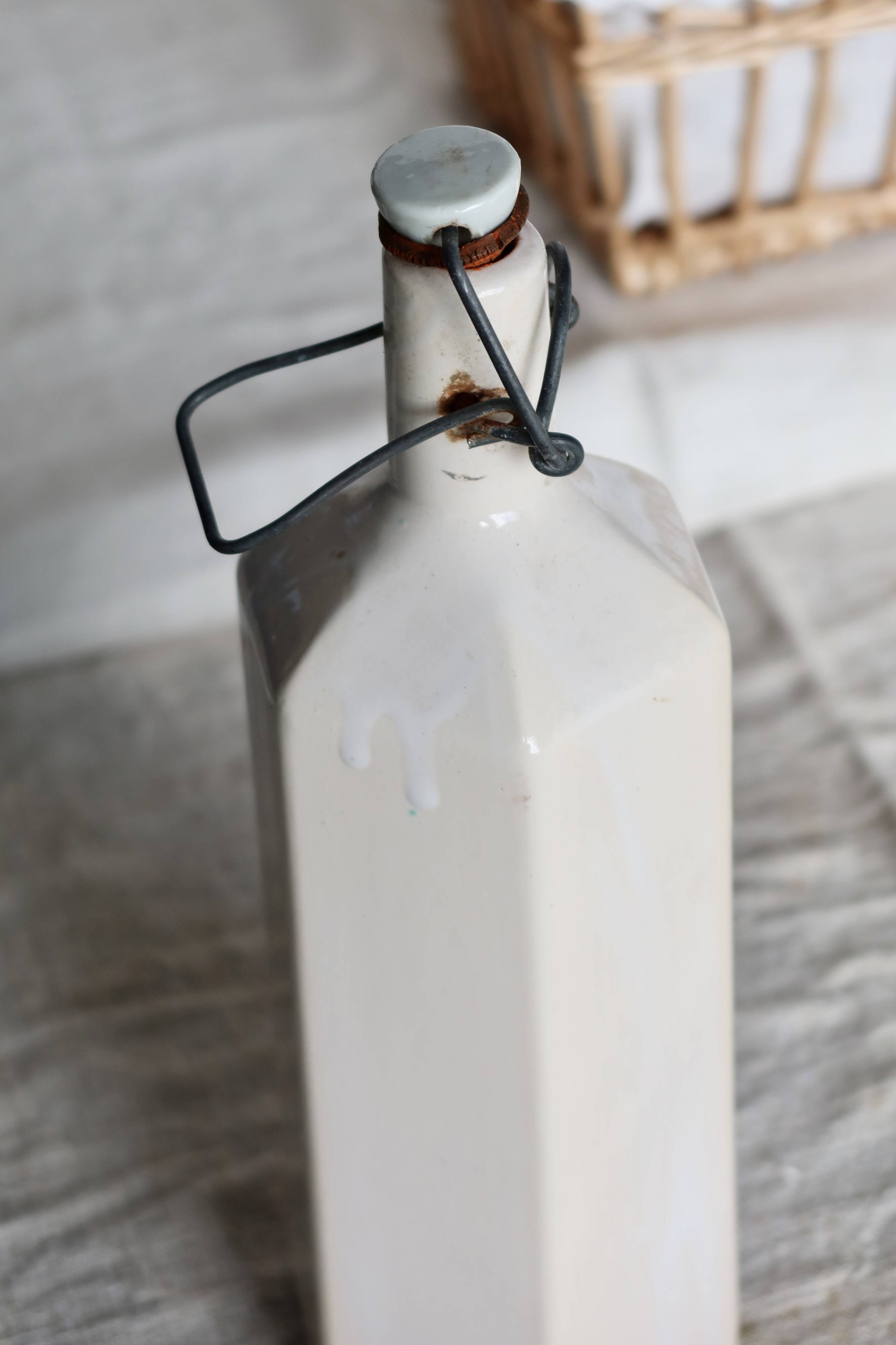 Antique beige glazed ceramic bottle