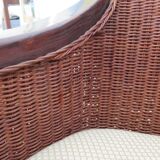 Vintage colonial-style armchair in woven rattan and exotic wood