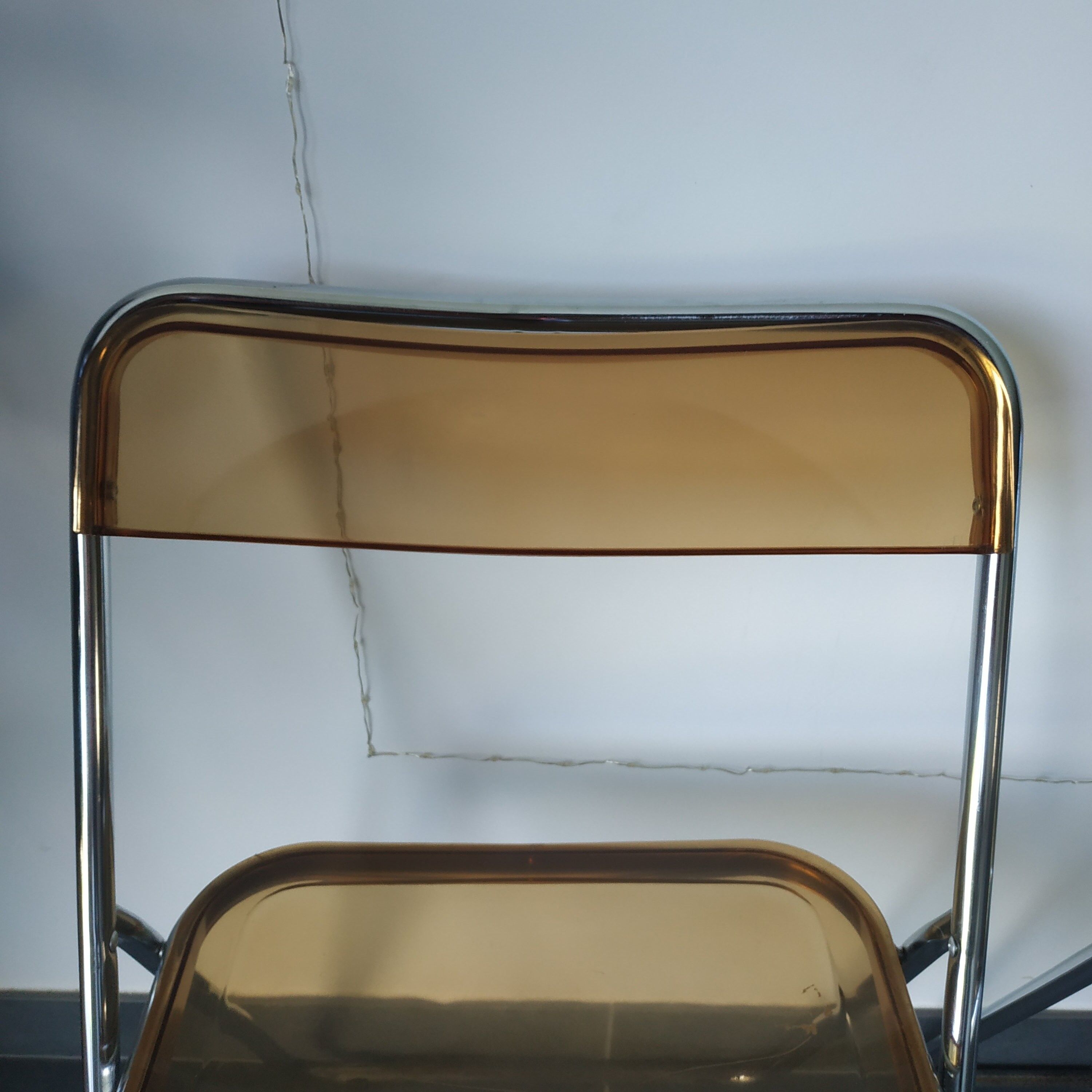 Seventies stainless steel and caramel chairs