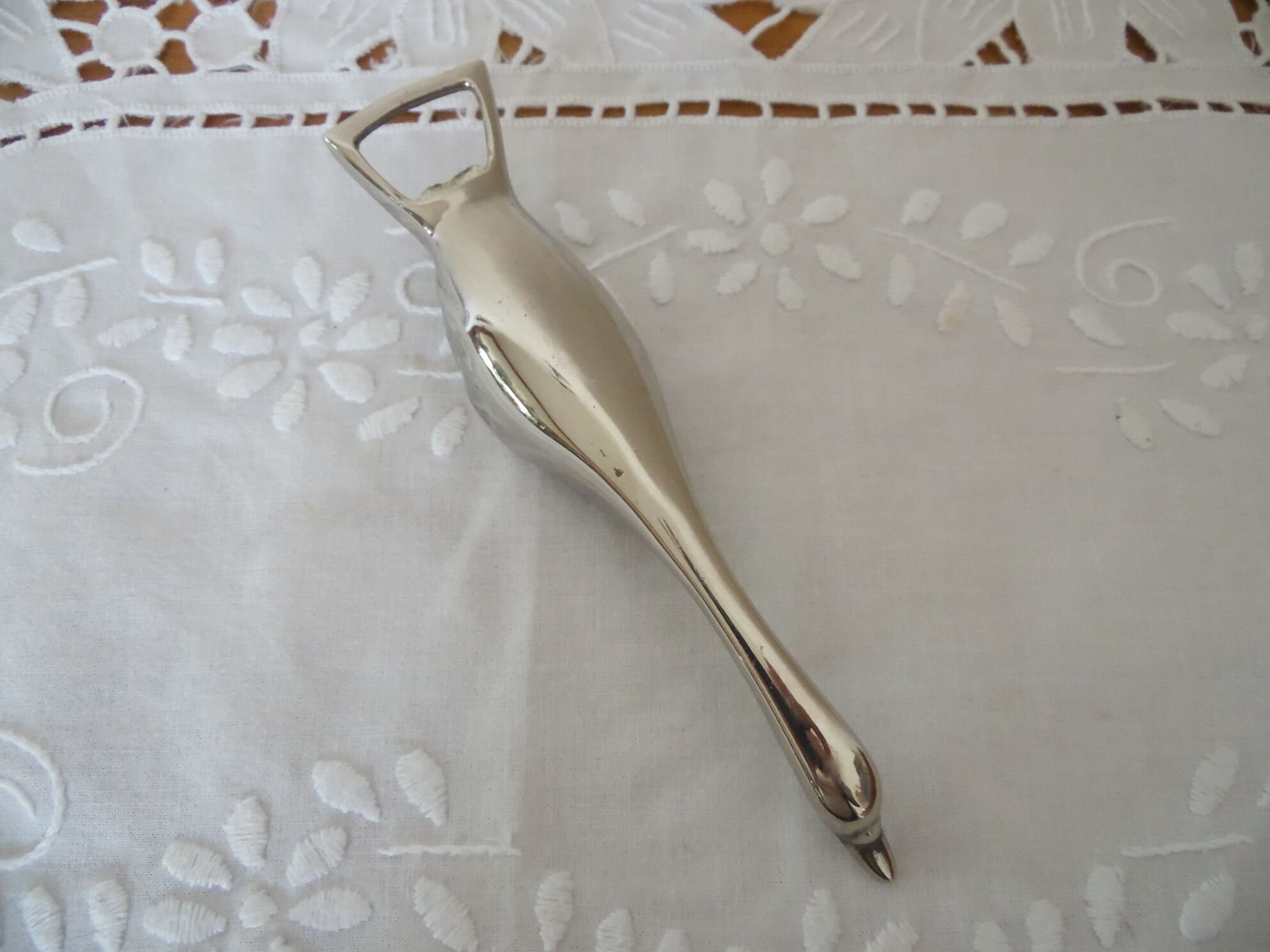 Open bottle silver metal goose