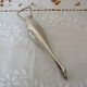 Open bottle silver metal goose