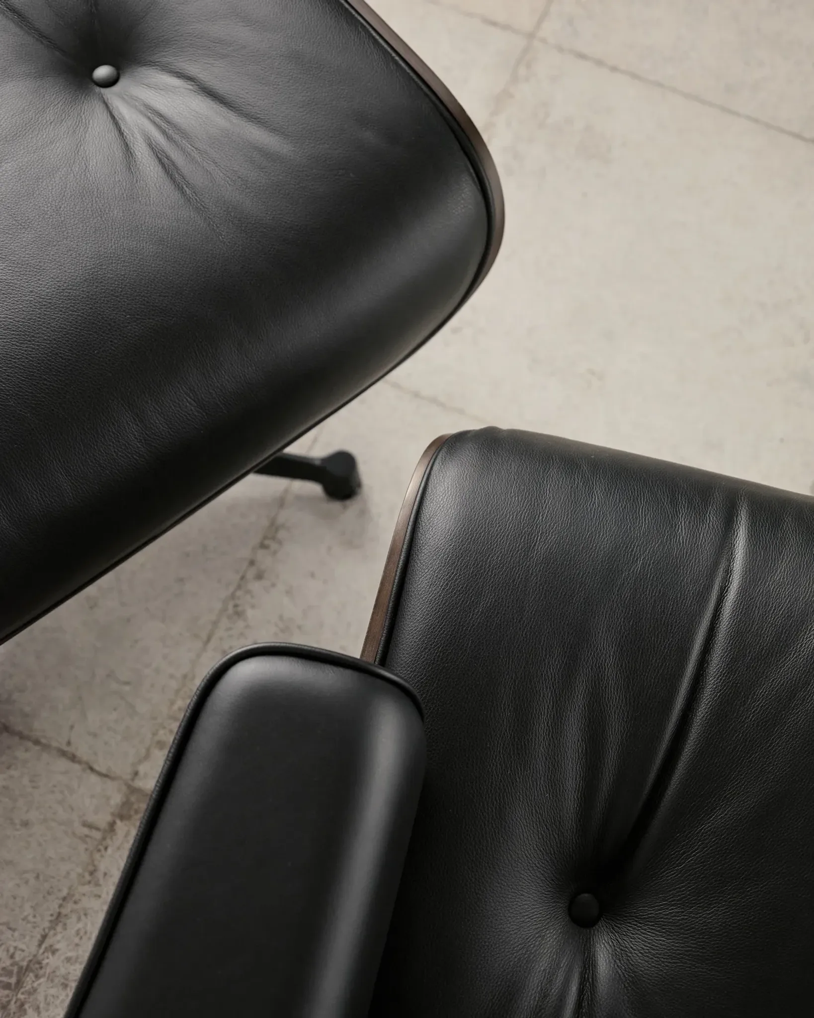 Lounge Chair and ottoman in black leather by Charles & Ray Eames, Vitra