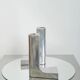 Pair of candlesticks "L", 1970-1980