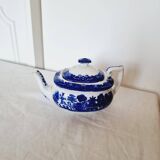 Small porcelain teapot or milk jug with the famous blue willow or weeping pattern
