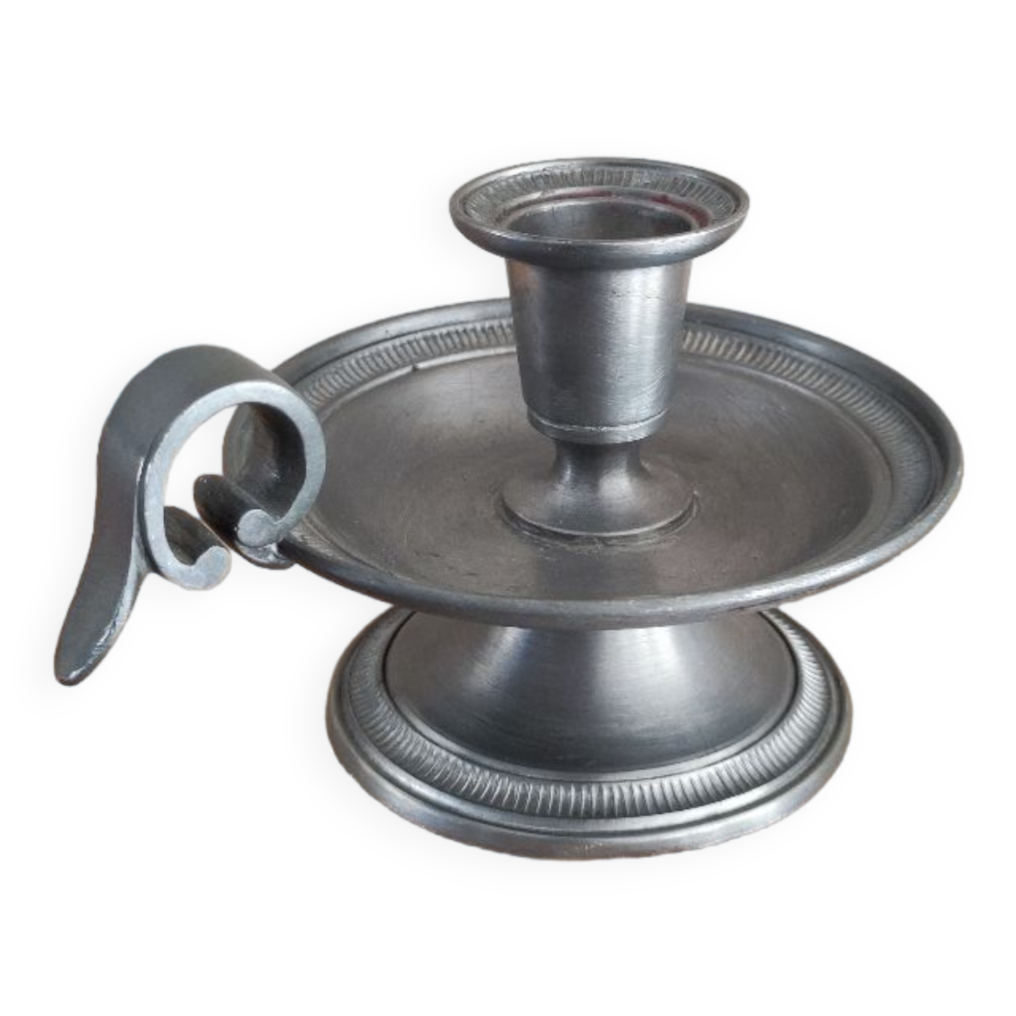 Tin hand candle holder.