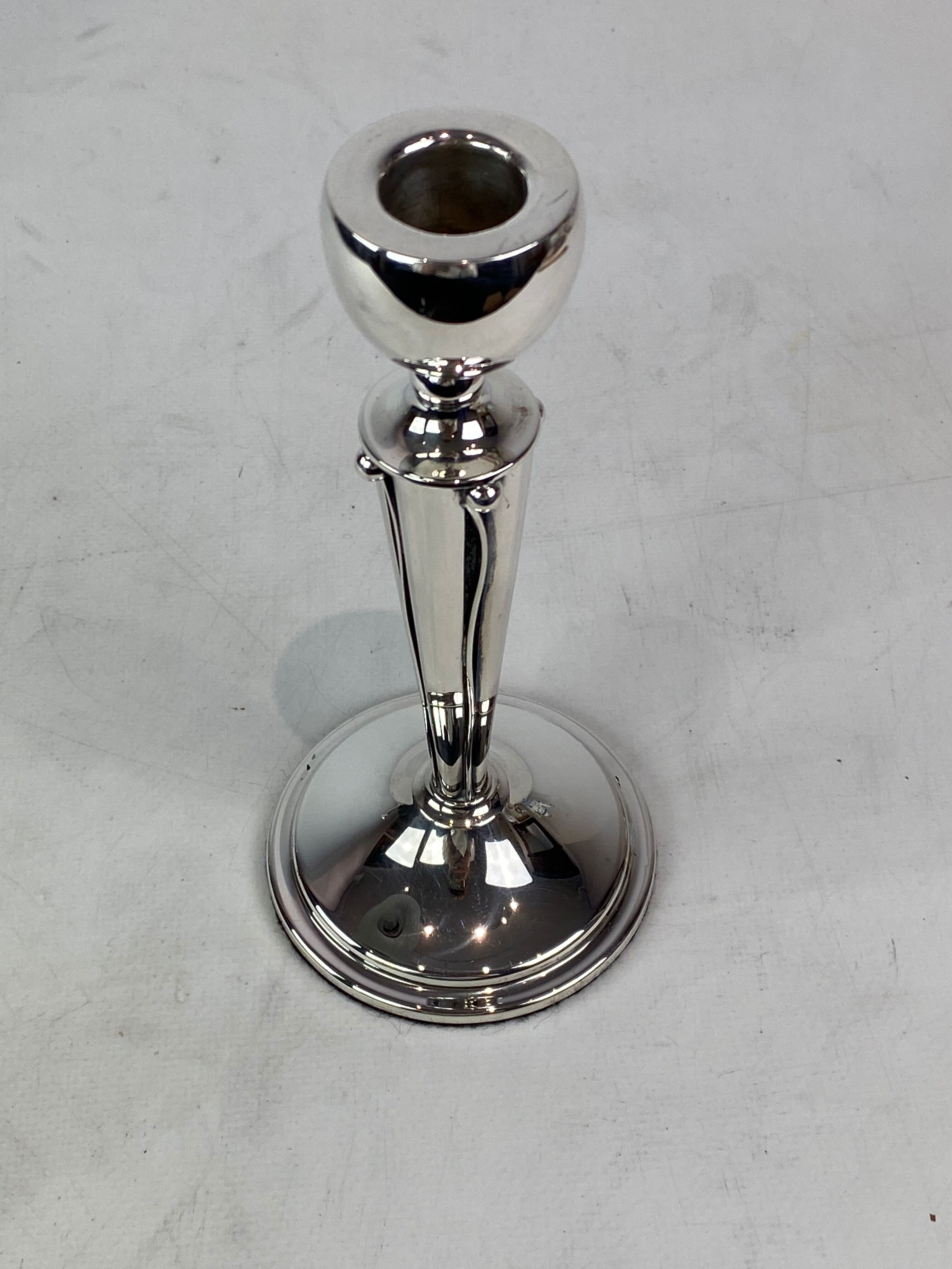 Set of candlesticks of hallmarked silver, 1920s