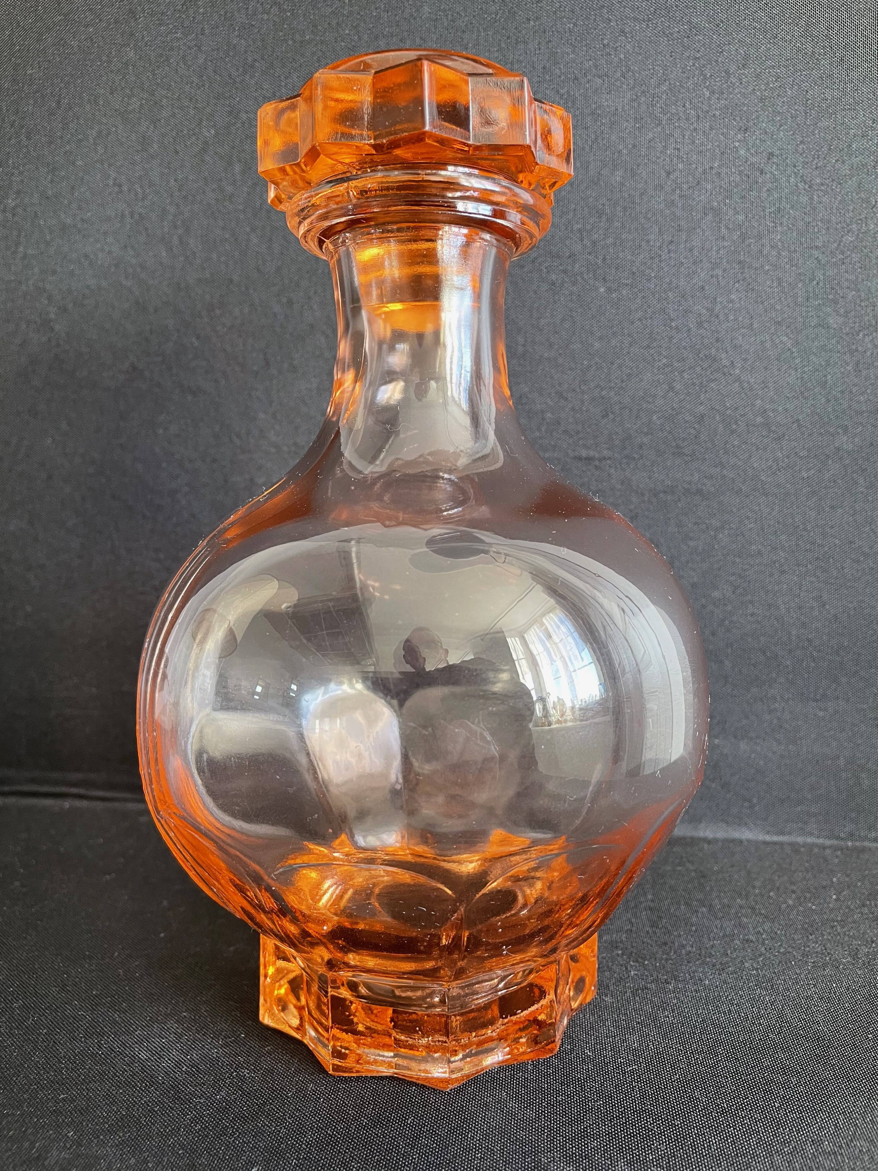 Liquor service in pink moulded glass