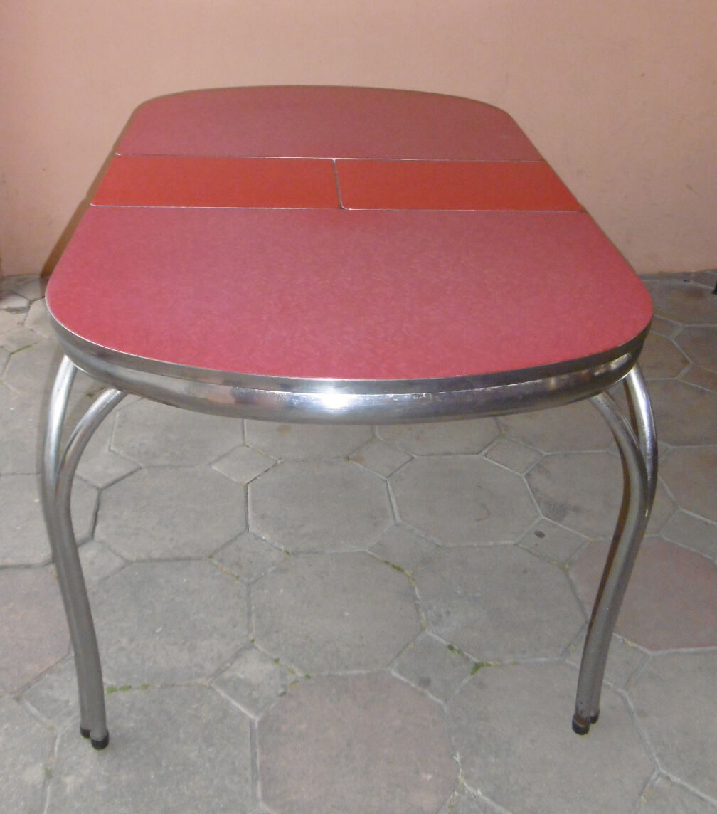 Vintage table of the 60s in red formica and chrome legs