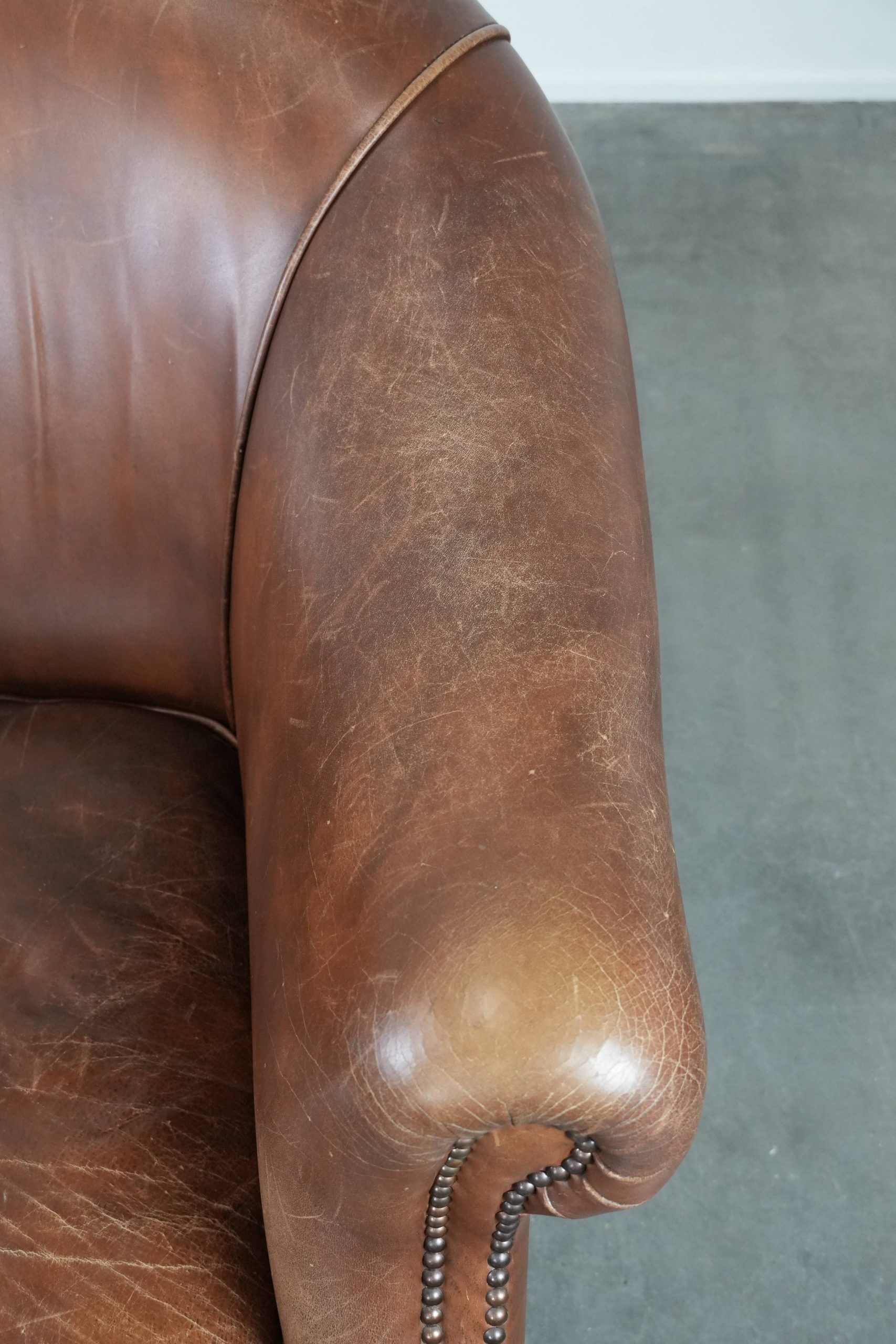 Cognac-coloured vintage cow leather club armchair in English style