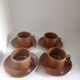 Stoneware coffee cups and saucers
