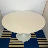 White dining table with tulip base by Maurice Burke