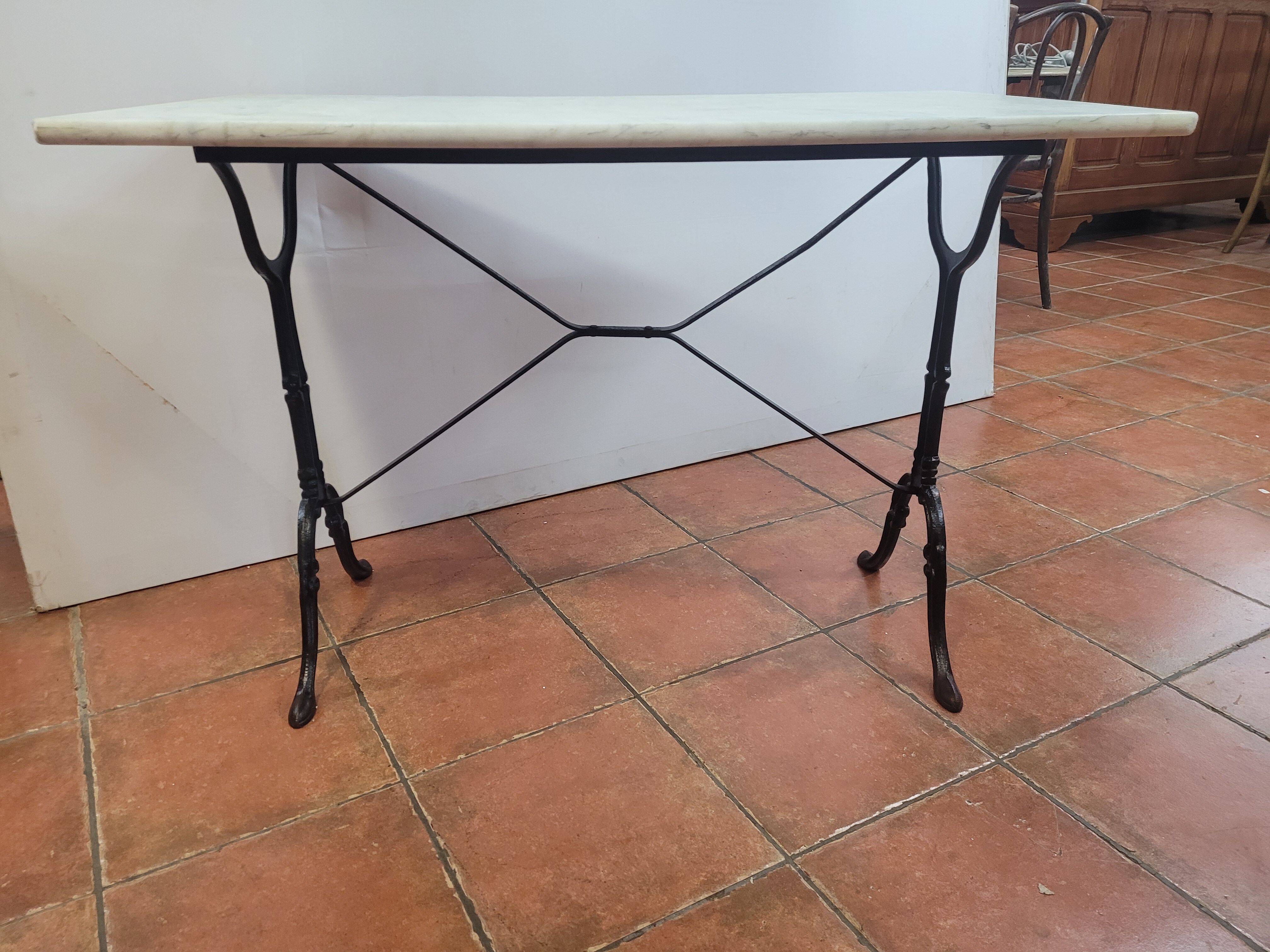 Bistro table base cast iron over marble