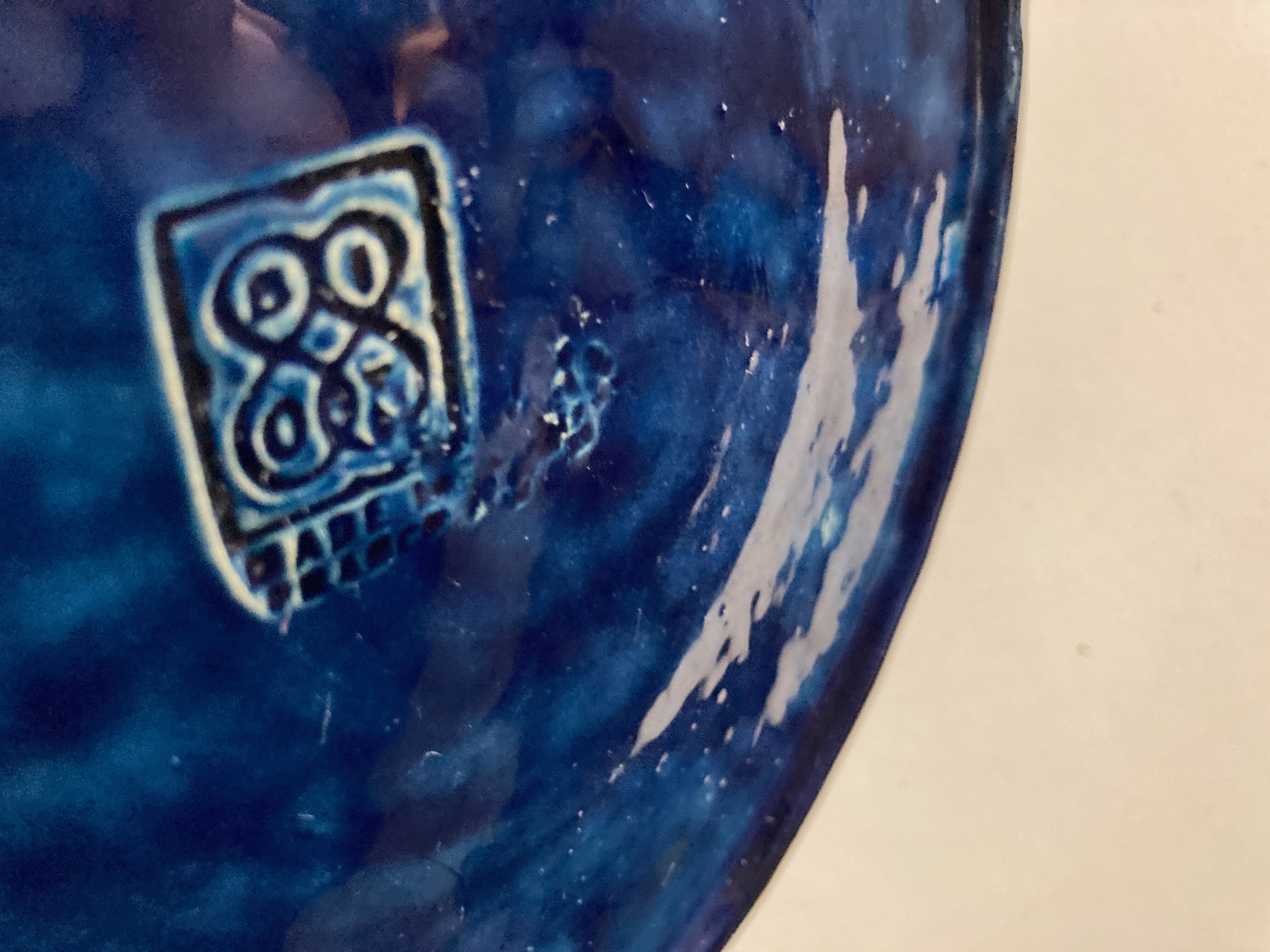 Set of 8 plates with godrons in glazed earth of biot