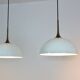Paire de suspensions en laiton et verre opale blanc par Florian Schulz