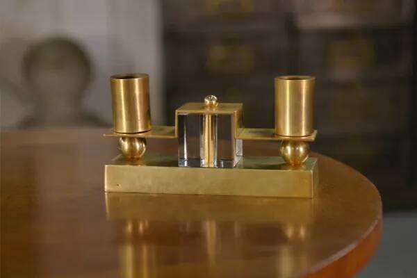 Pair of brass and Bohemian crystal wall lights in the style of Jean Royère, 1940s