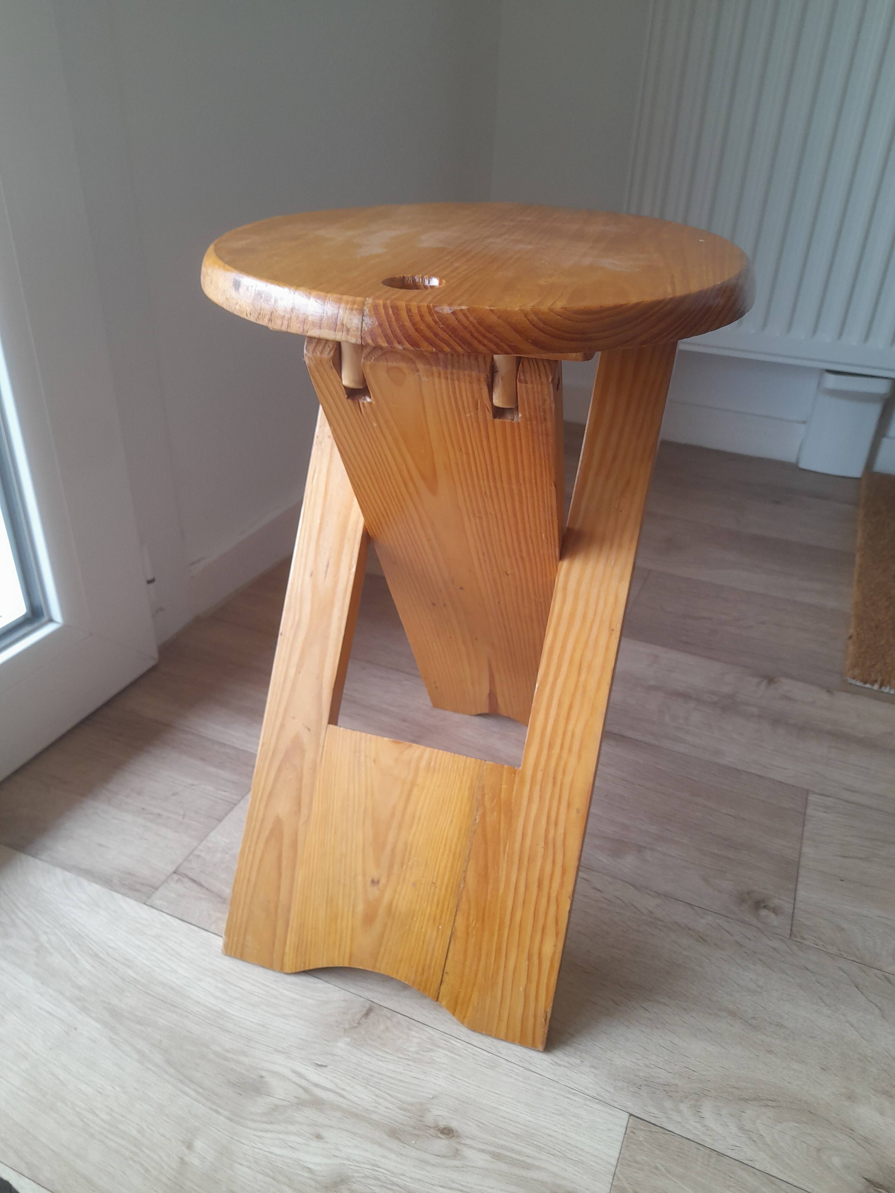 Folding wooden stool by Roger Tallon from the 1970s.