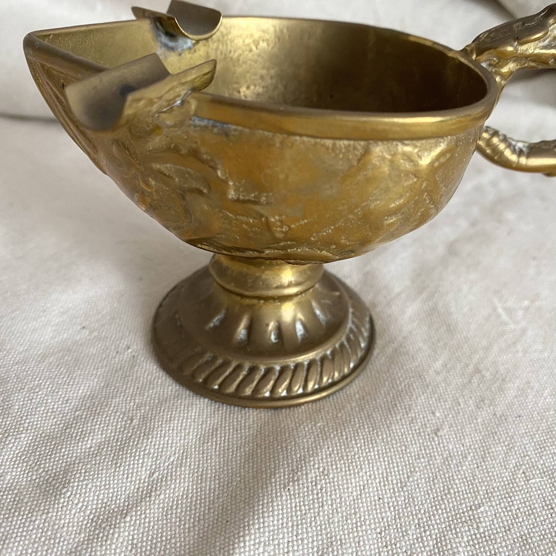 Antique embossed brass ashtray