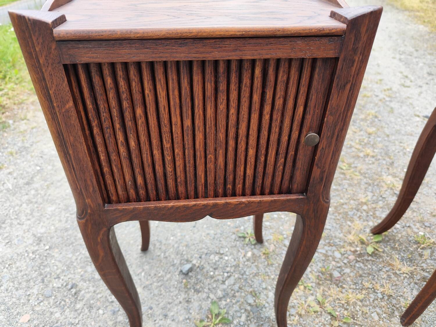 Pair of oak bedside tables with curtained niche doors