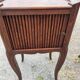 Pair of oak bedside tables with curtained niche doors