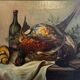 Still life with bottle and game, signed, 20th century