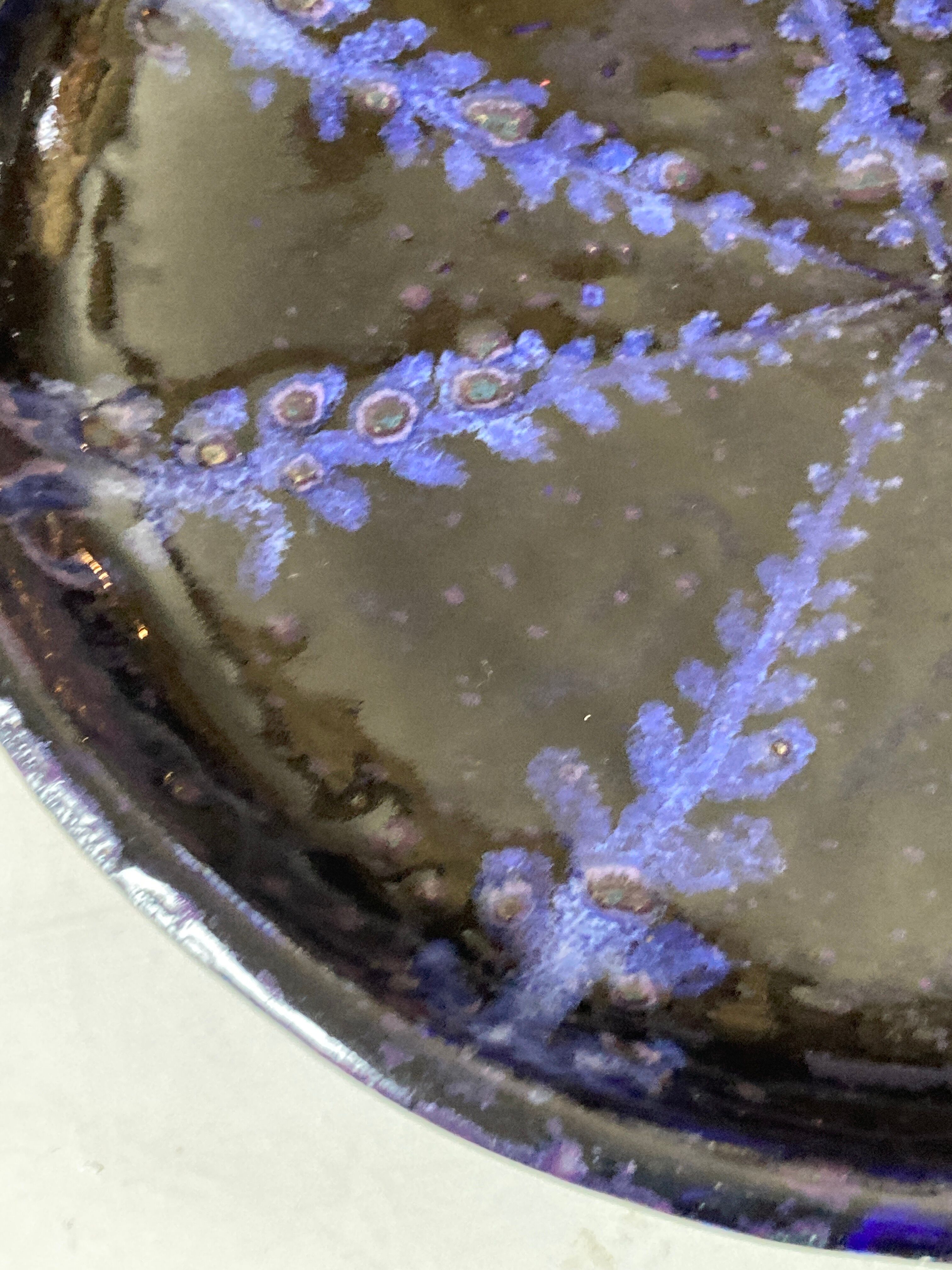 White terracotta dish enamelled with a blue sea urchin decoration