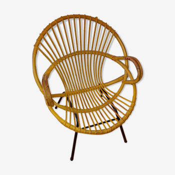 Yellow rattan armchair