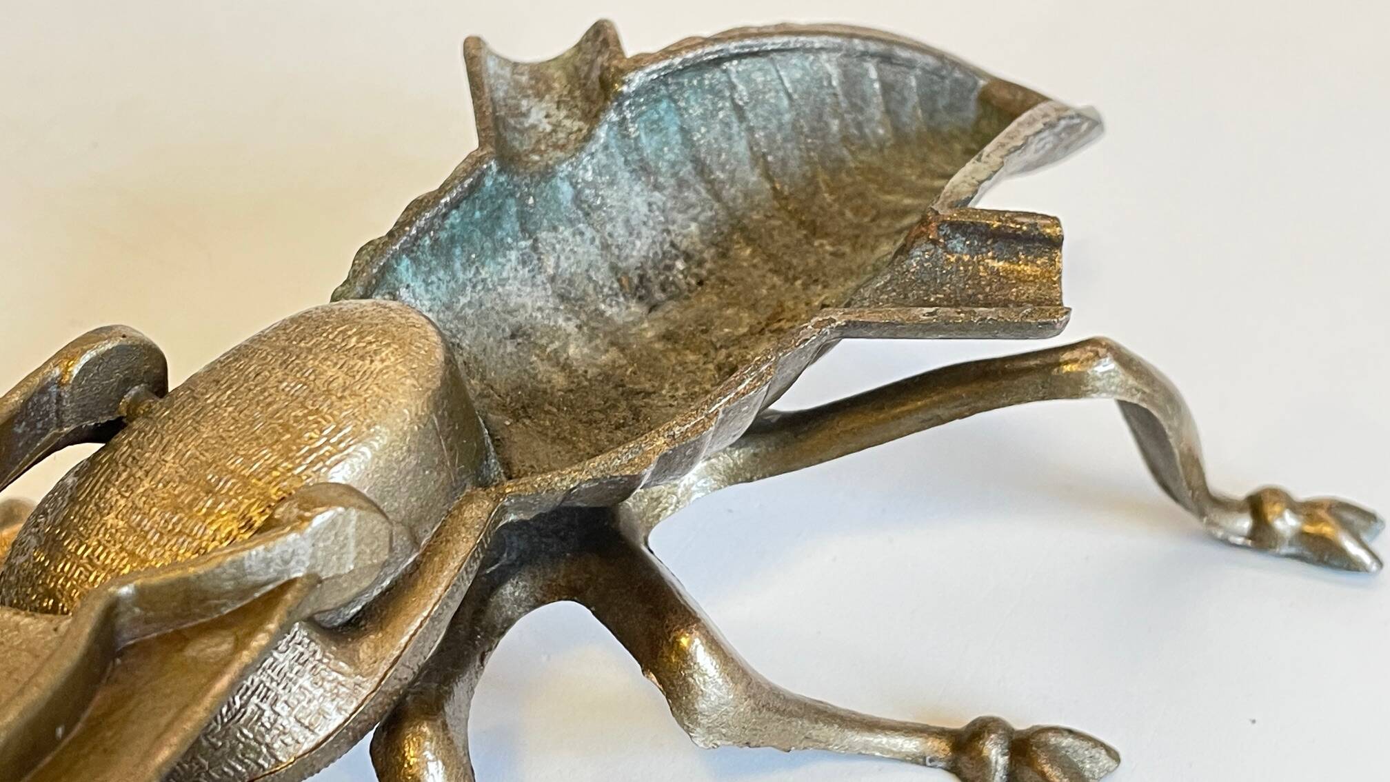 Vintage fly ashtray in patinated metal