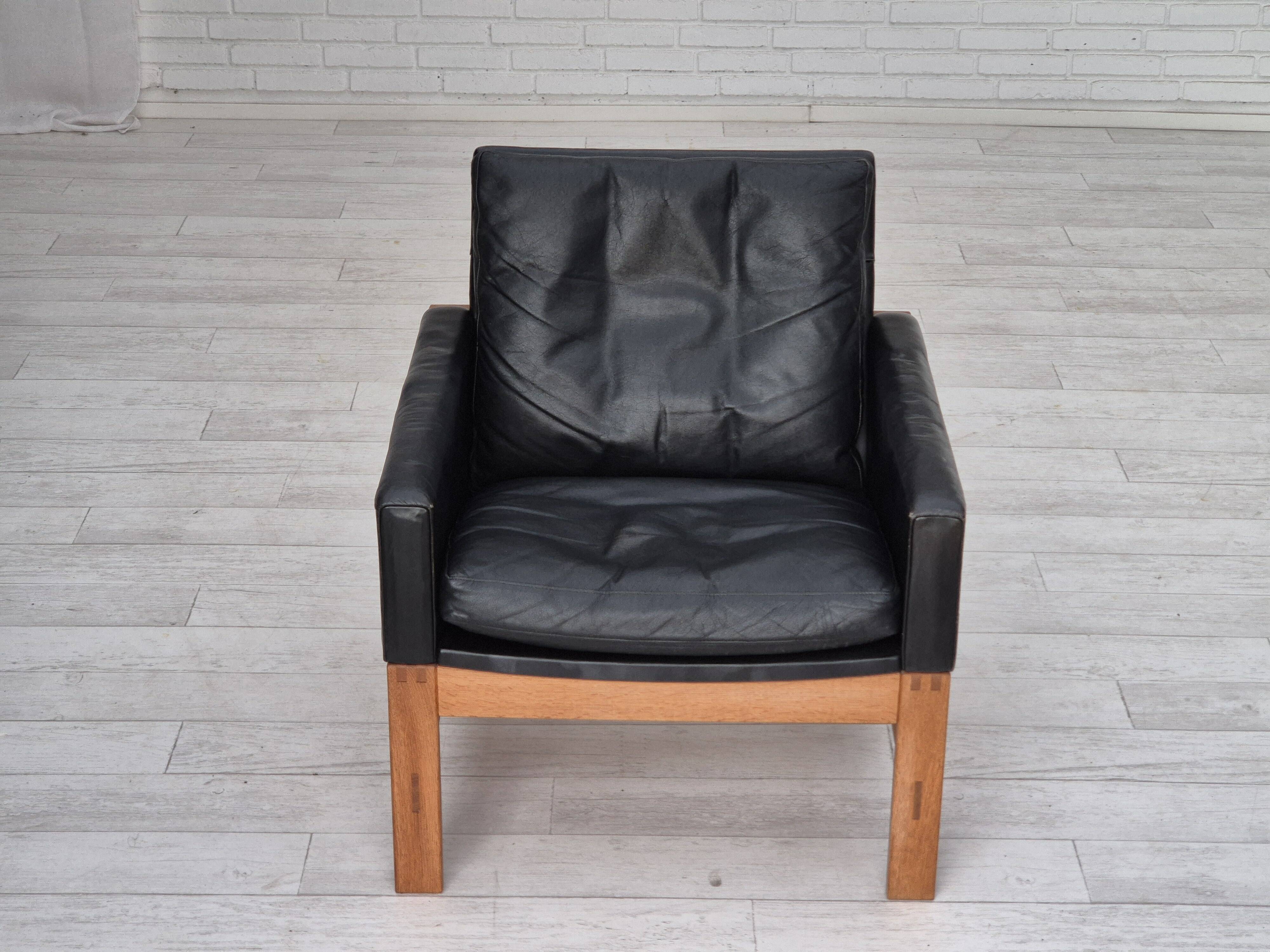 1960s, Danish lounge chair, original condition, furniture leather, solid oak wood.