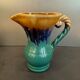 Flamed stoneware pitcher signed Alpho, no. 114