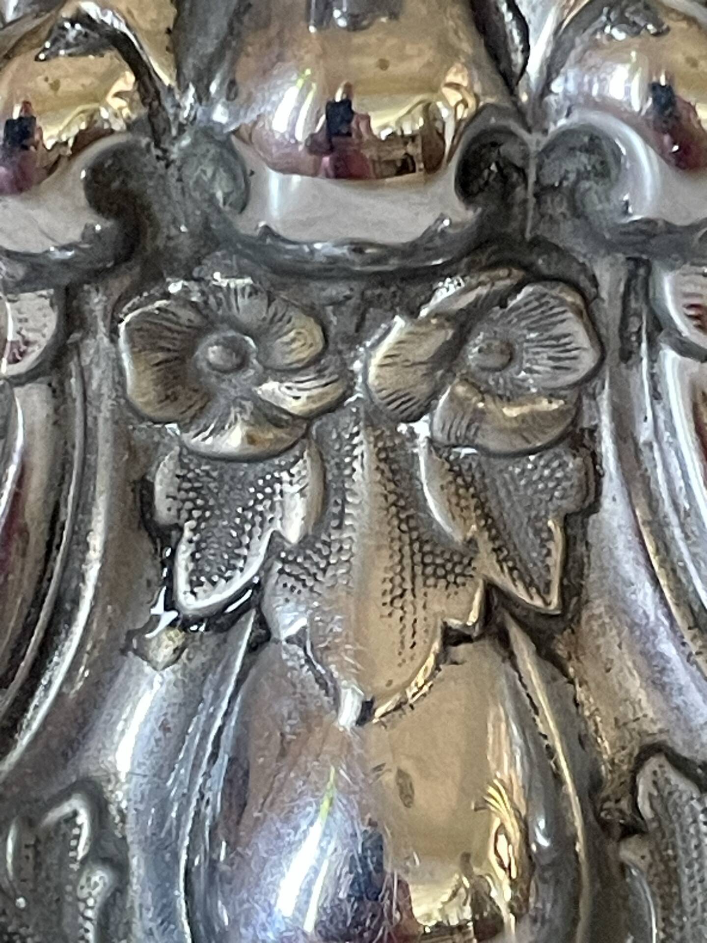 Pair of rococo silver-plated candlesticks