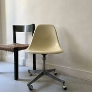 Ecru fibreglass wheelchair by H. Miller for International Furniture