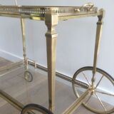 Brass rolling table from the Baguès house.