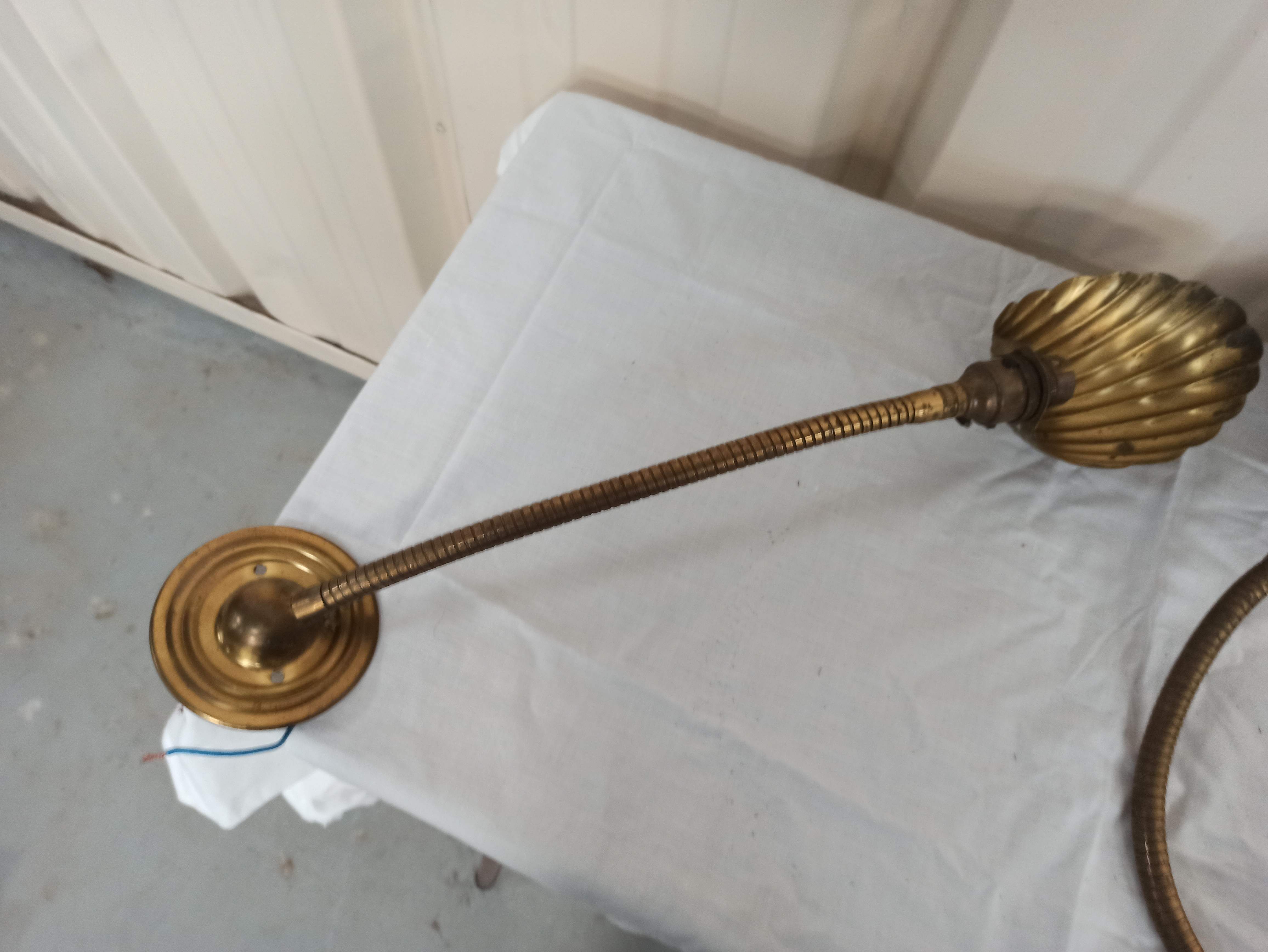 Trio of wall lamps Christopher Wray applies articulated lamp shell