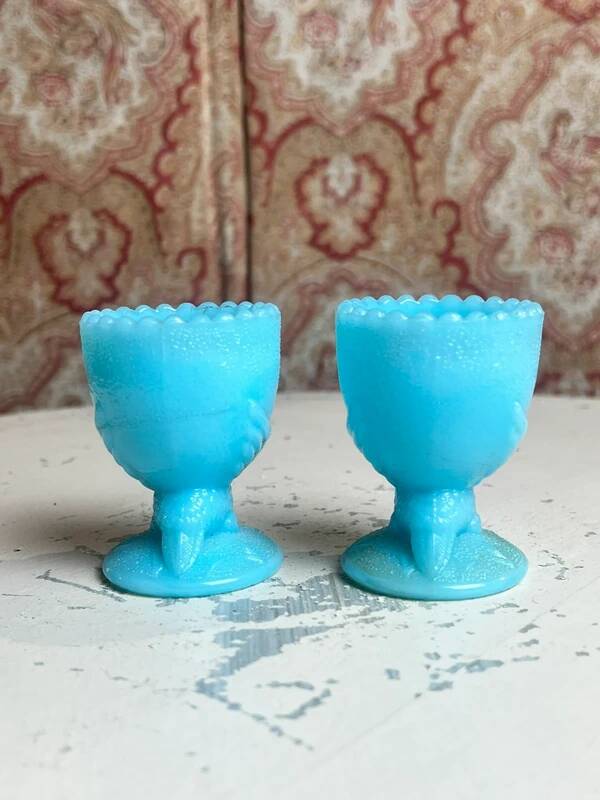 Pair of blue opaline egg cups signed SV Schmid Glassworks