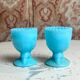 Pair of blue opaline egg cups signed SV Schmid Glassworks