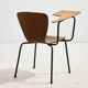 Teak chair with writing tablet