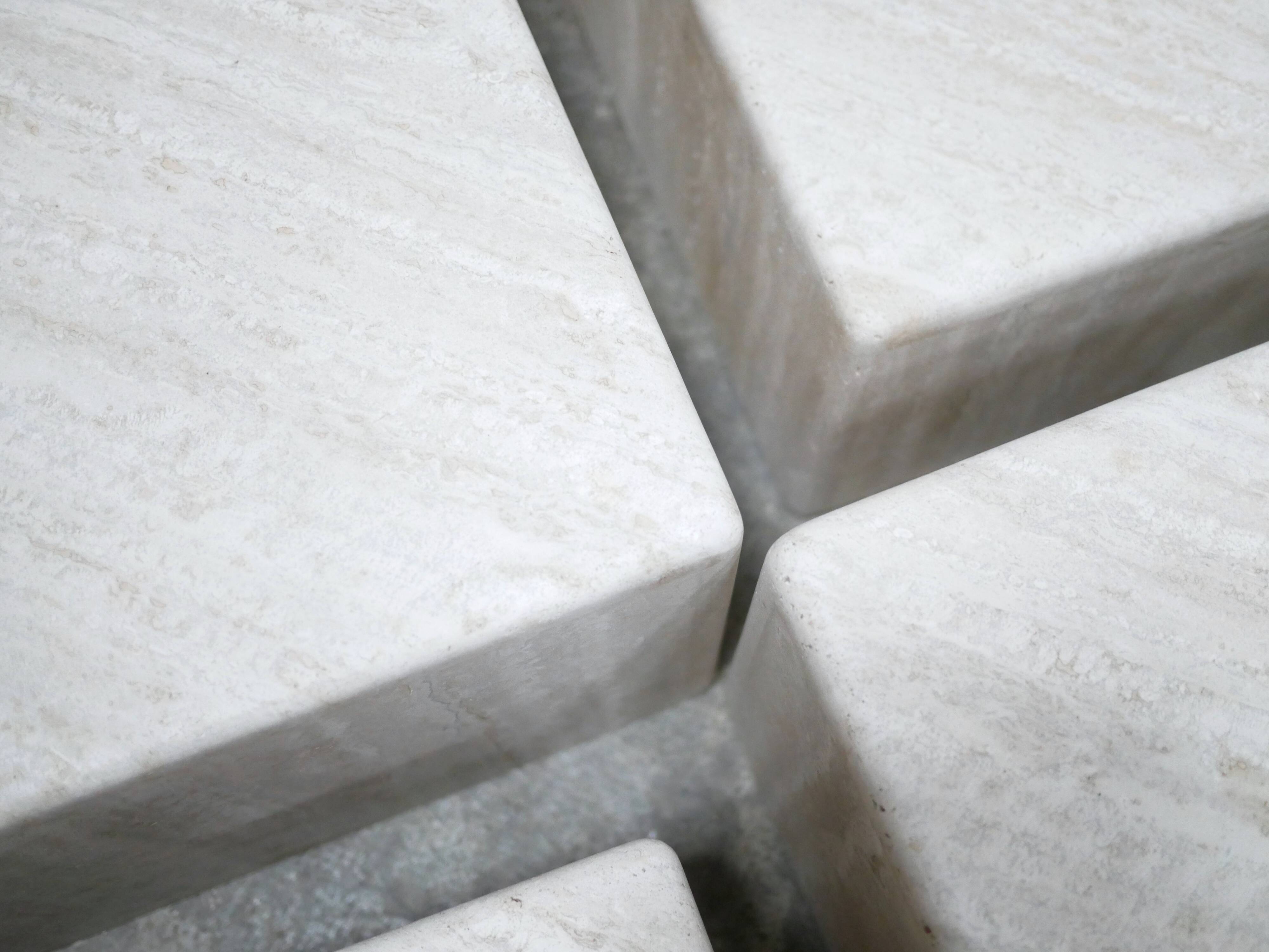 Vintage travertine coffee table published by Roche Bobois